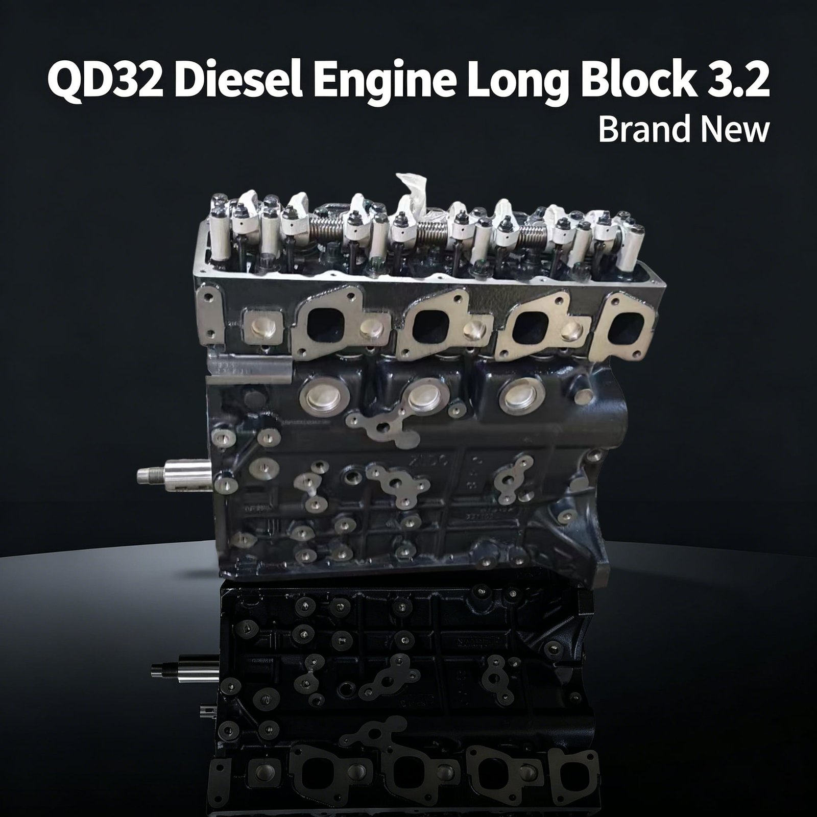 QD32 bare engine front view – Nissan 3.2L diesel head and block